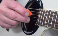 using a guitar pick